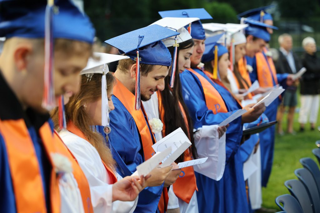 Group of smiling Poland graduates