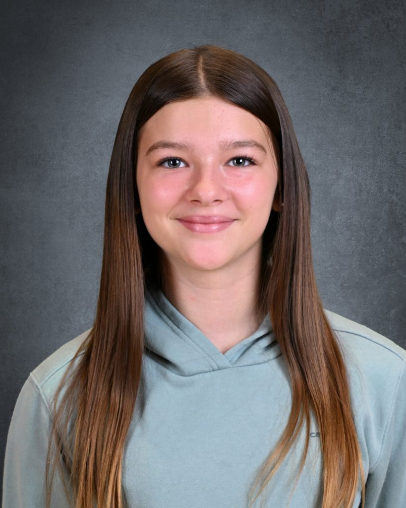Headshot of Riley Archer