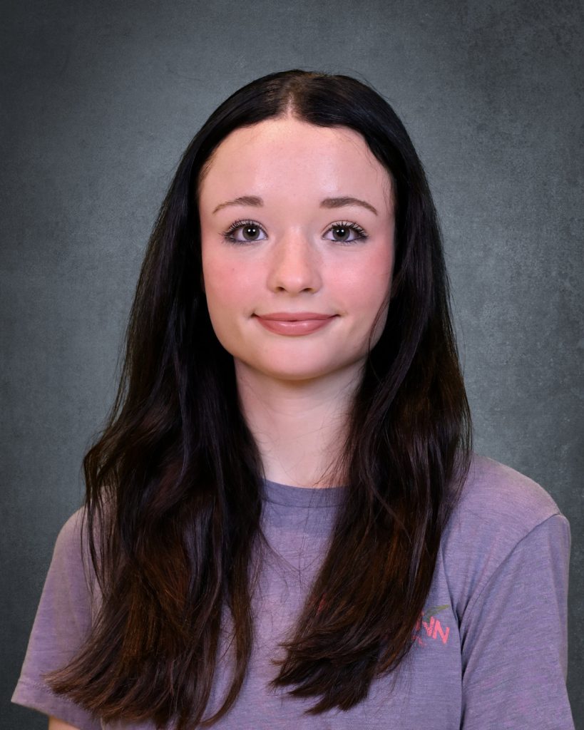 student, Lia Dutcher, posing for student picture day
