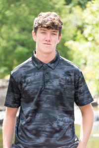 senior photo of Class of 2026 Salutatorian Noah Lamphere, posing and smiling