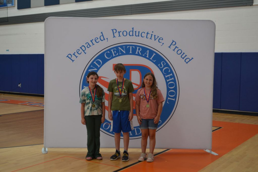 students posing and smiling together